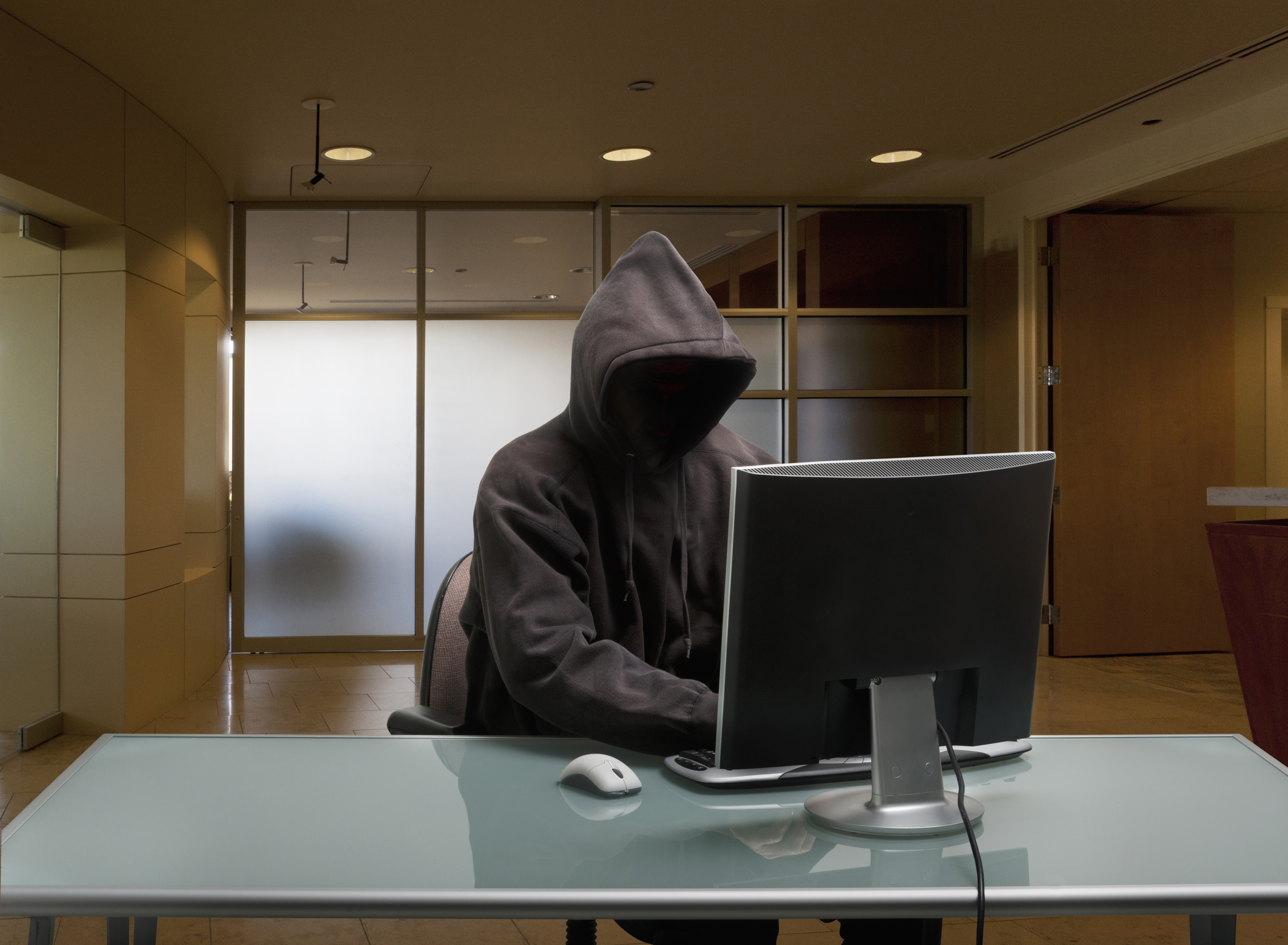Hacker wearing a hoodie